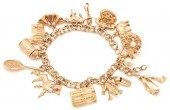 14K CHARM BRACELET W/ 14 CHARM