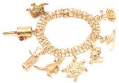 14K CHARM BRACELET W/ 8 GOLD C
