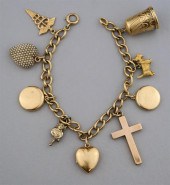 14K CHARM BRACELET WITH NINE 1