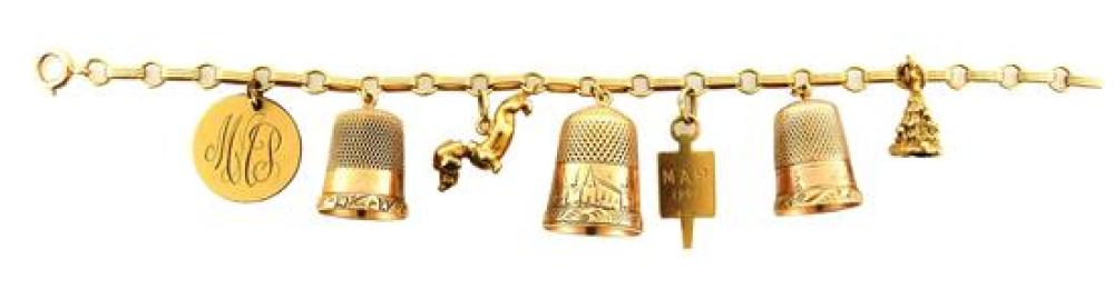 14K CHARM BRACELET WITH SEVEN
