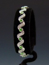 14K DIAMOND & TSAVORITE BRACEL