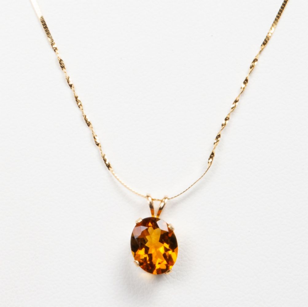 14K GOLD 1.80CT. OVAL MADEIRA