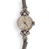 14K GOLD AND DIAMOND GIRARD PE