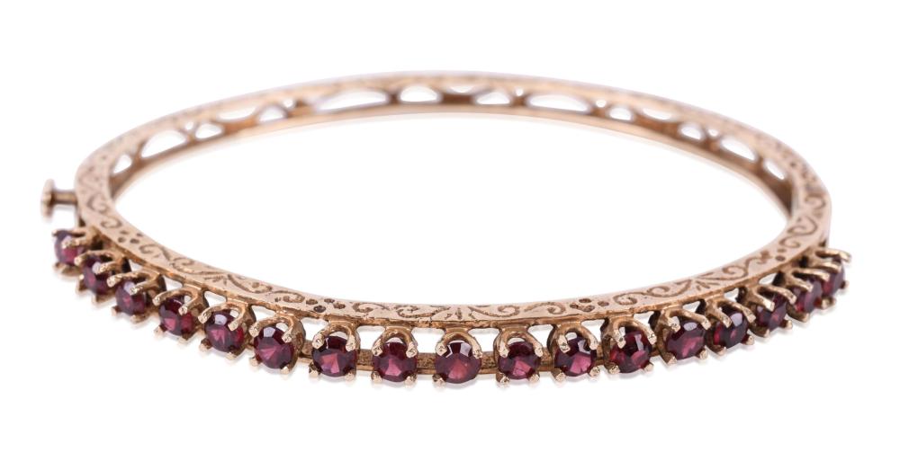 14K GOLD AND FACETED GARNET OVAL