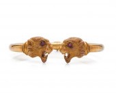 14K GOLD AND RUBY BANGLE BRACE