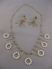 14k Gold Pearl Necklaceby Winf