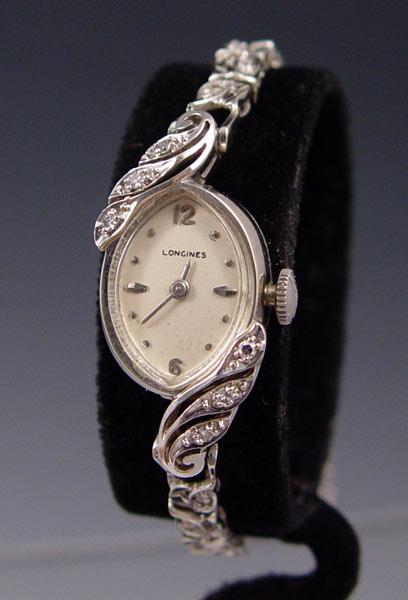 14K LONGINES DIAMOND WATCH CA.