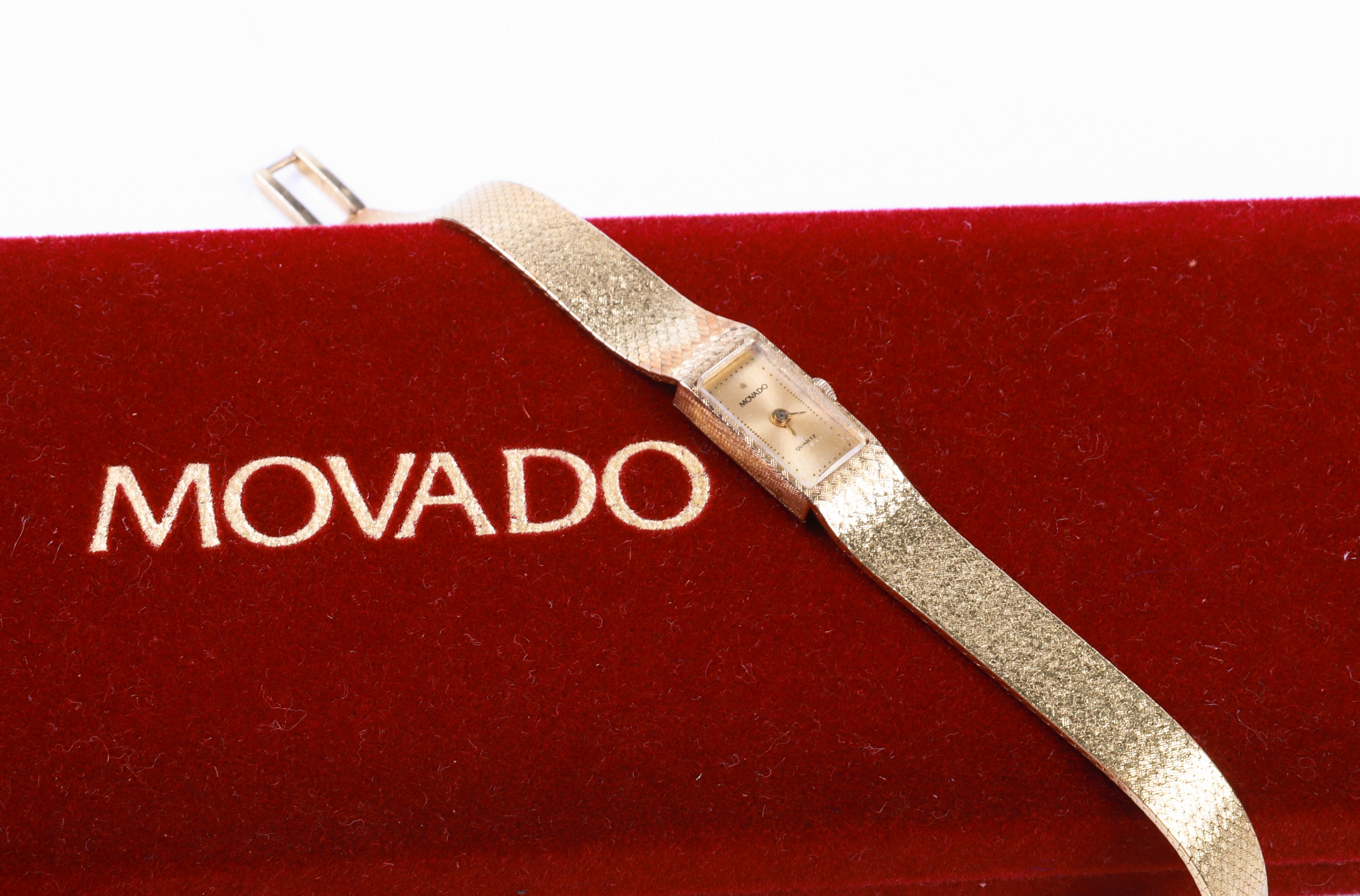 14K Movado ladies bracelet watch,