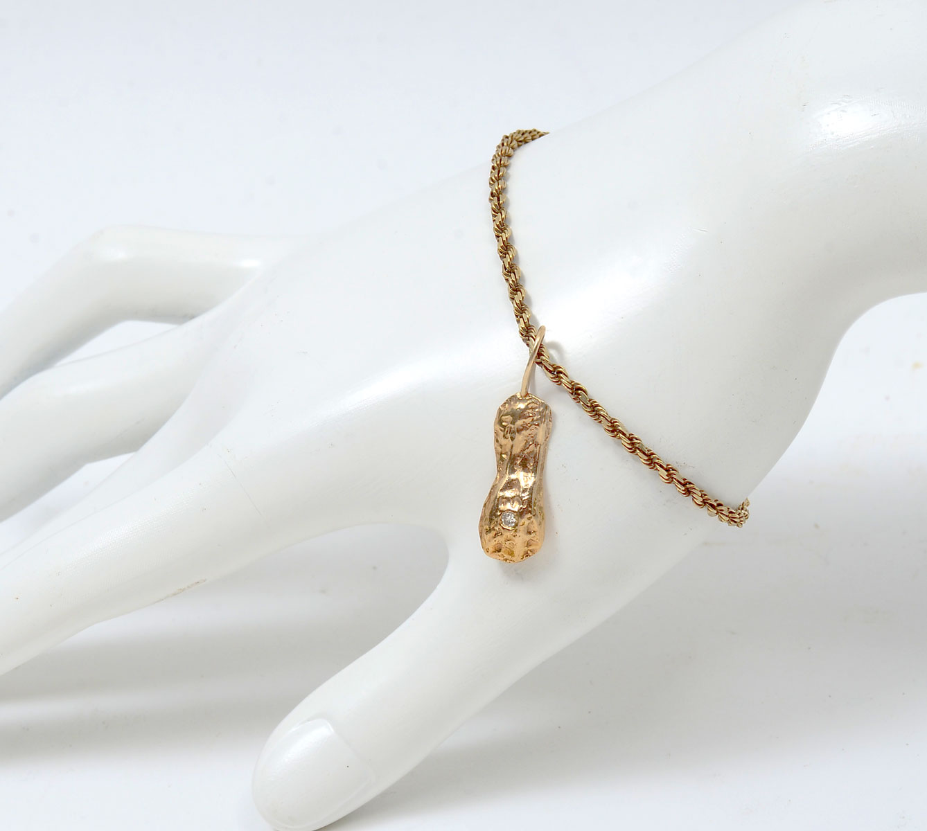 14K PEANUT CHARM ON ROPE