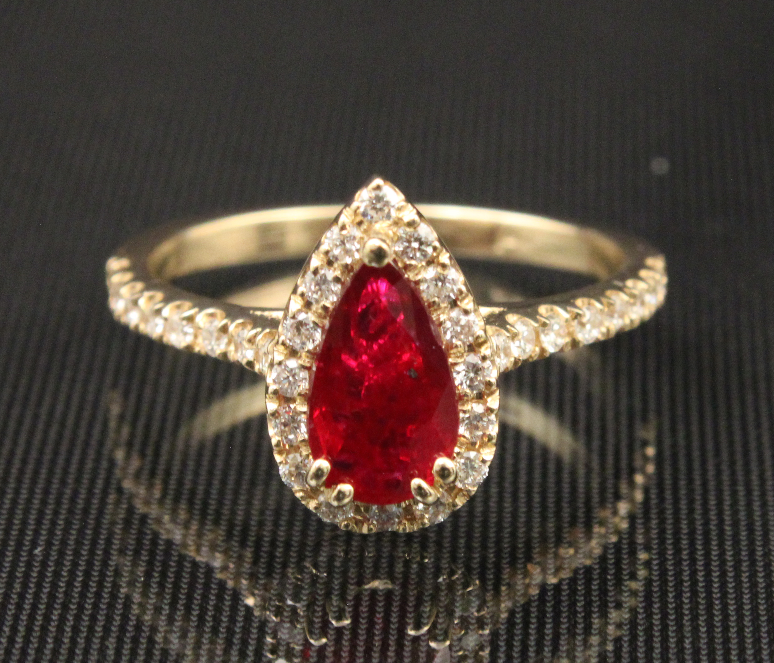 14K RUBY AND DIAMOND RING; 1.10