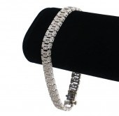 14K WG & DIAMOND FLEXIBLE BRAC