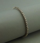 14K WHITE GOLD 5.01CTTW. TENNI