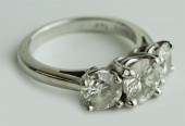 14K WHITE GOLD AND THREE STONE