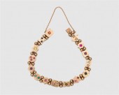14K YELLOW GOLD AND GEMSET SLI