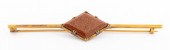 14K YELLOW GOLD GOLDSTONE BROO
