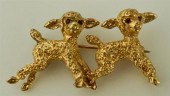 14K YELLOW GOLD PIN OF TWO LAM