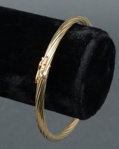 14K YELLOW GOLD TORQUE OVAL HI