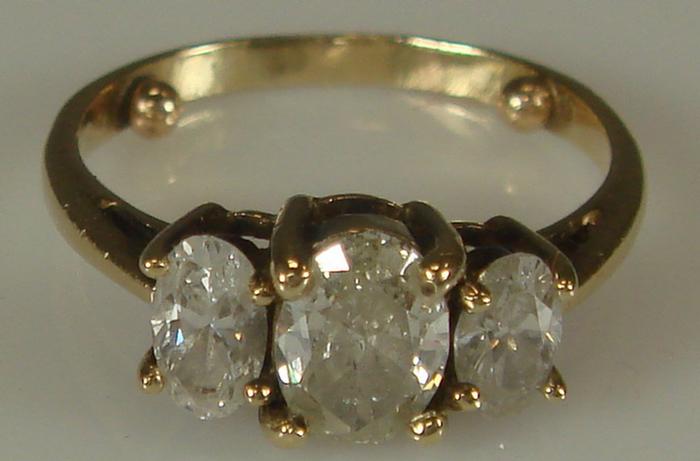 14K yg Diamond Ring. Three