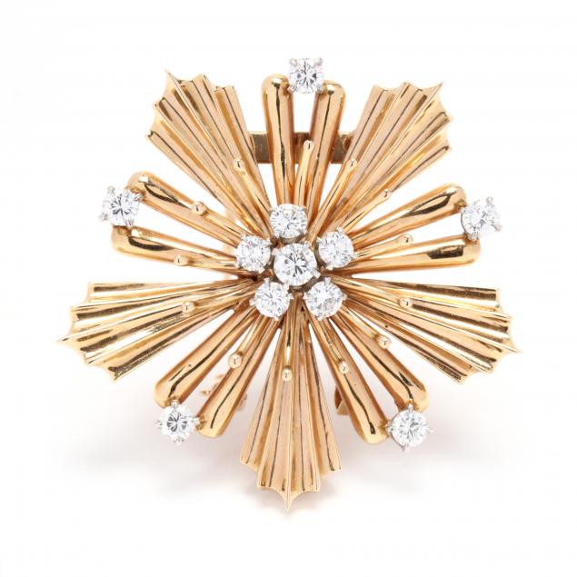 14KT GOLD AND DIAMOND BROOCH In a