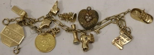 14KT GOLD CHARM BRACELET WITH