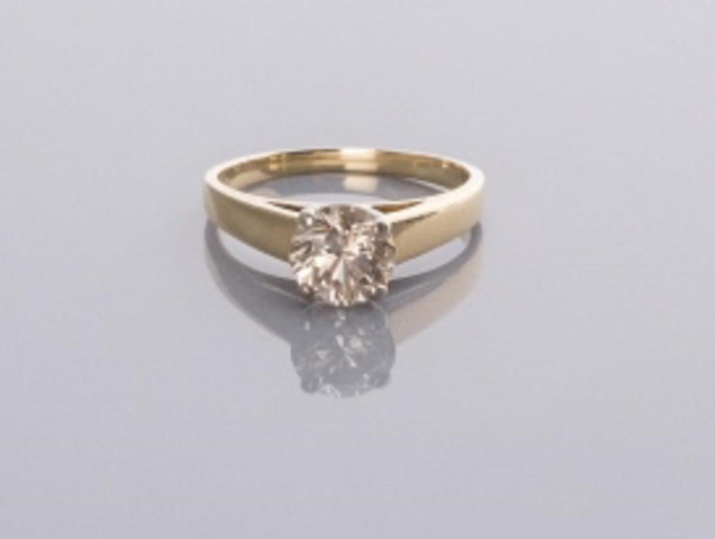 14KT GOLD DIAMOND SOLITAIRE RINGA
