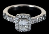 14KT. PRINCESS HALO DIAMOND RI