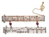 14KT. RUBY AND DIAMOND MUSICAL