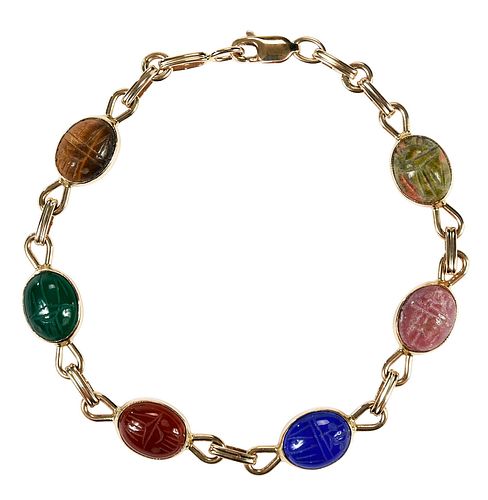 14KT. SCARAB BRACELETsix carved