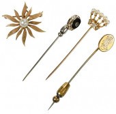 14KT. THREE STICK PINS AND ONE