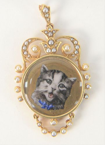 15 KARAT GOLD MEDALLION, WITH