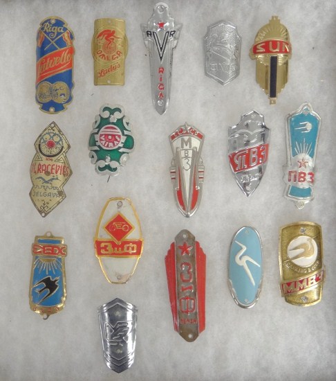 (16) head badges.