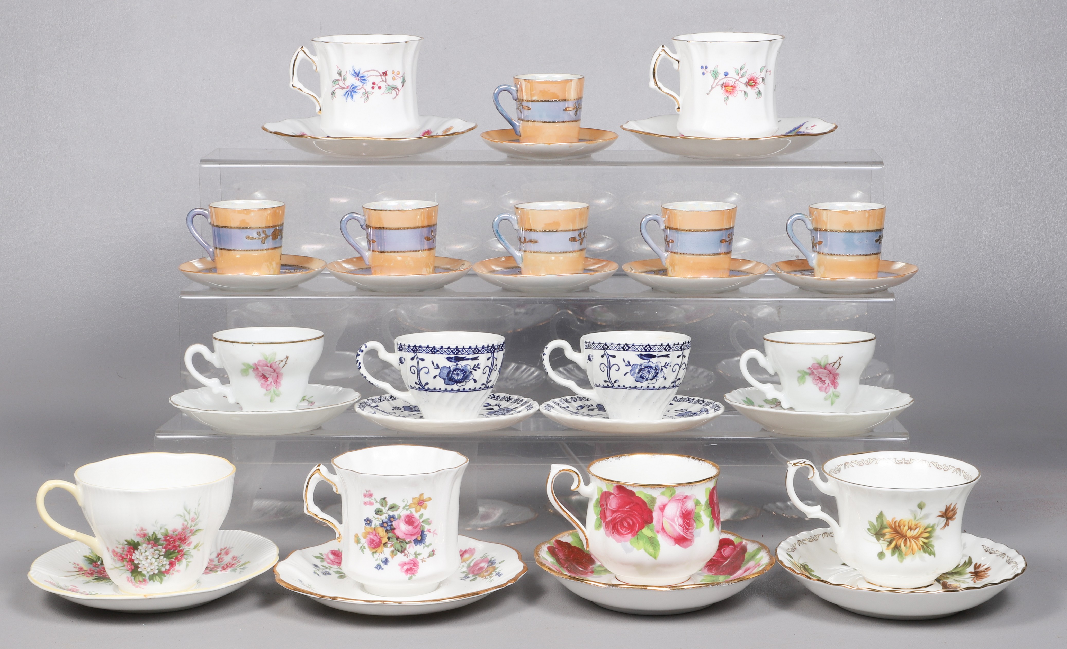 (16) Porcelain cup & saucer sets,