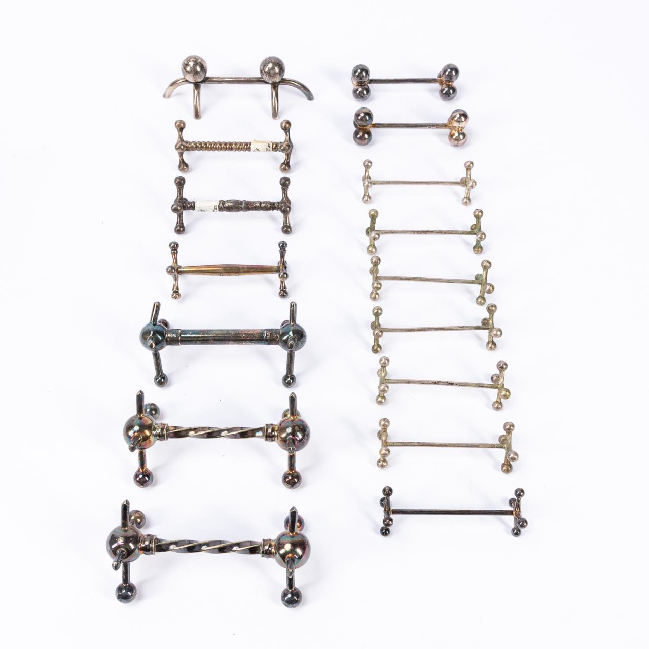 16 SILVERPLATE KNIFE RESTS,
