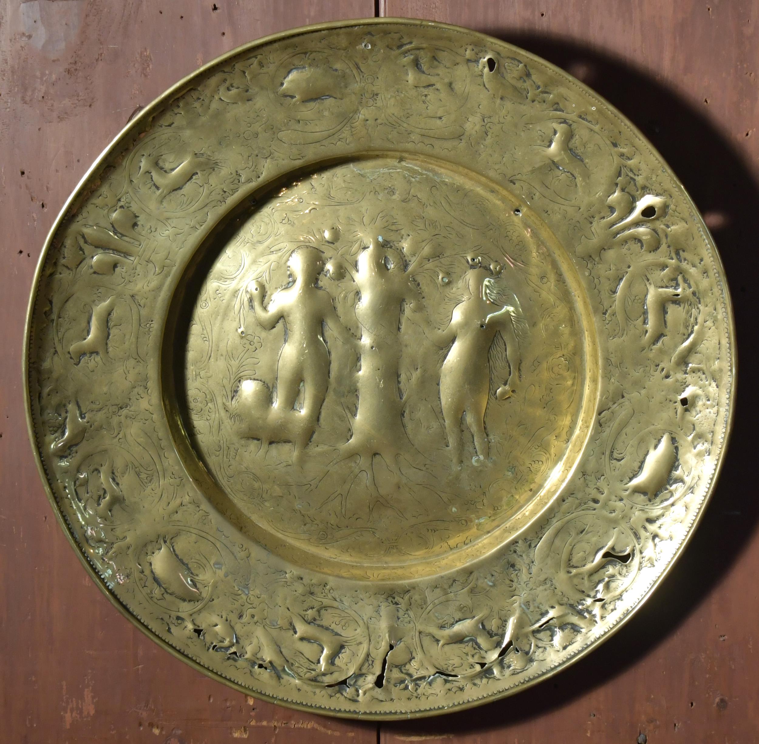 17TH C. ADAM & EVE BRASS CHARGER.