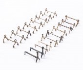 18 ANDIRON FORM KNIFE RESTS, O