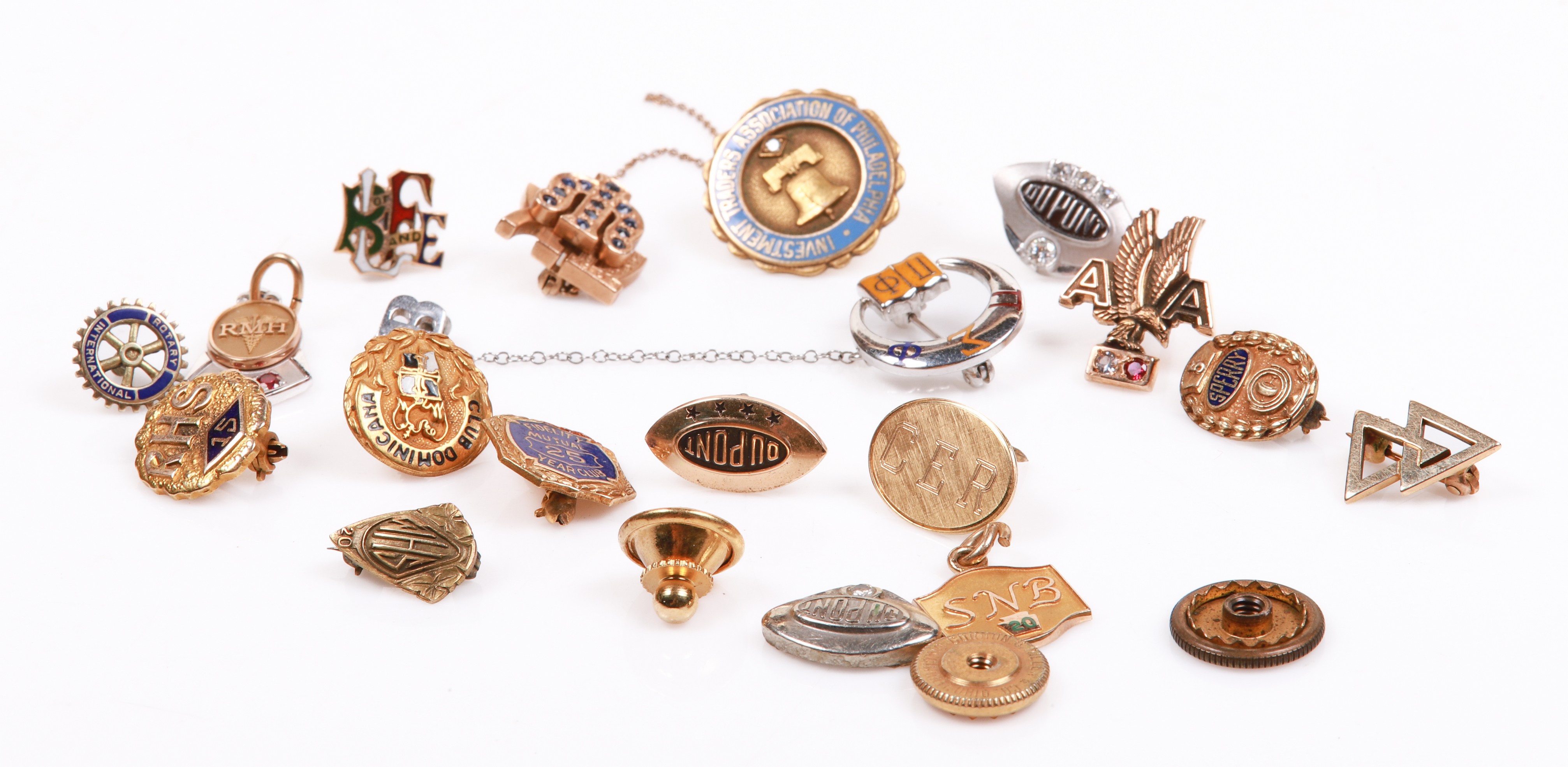 (18) Gold pins and charms to