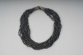 18 KARAT GOLD, STERLING, & HEM