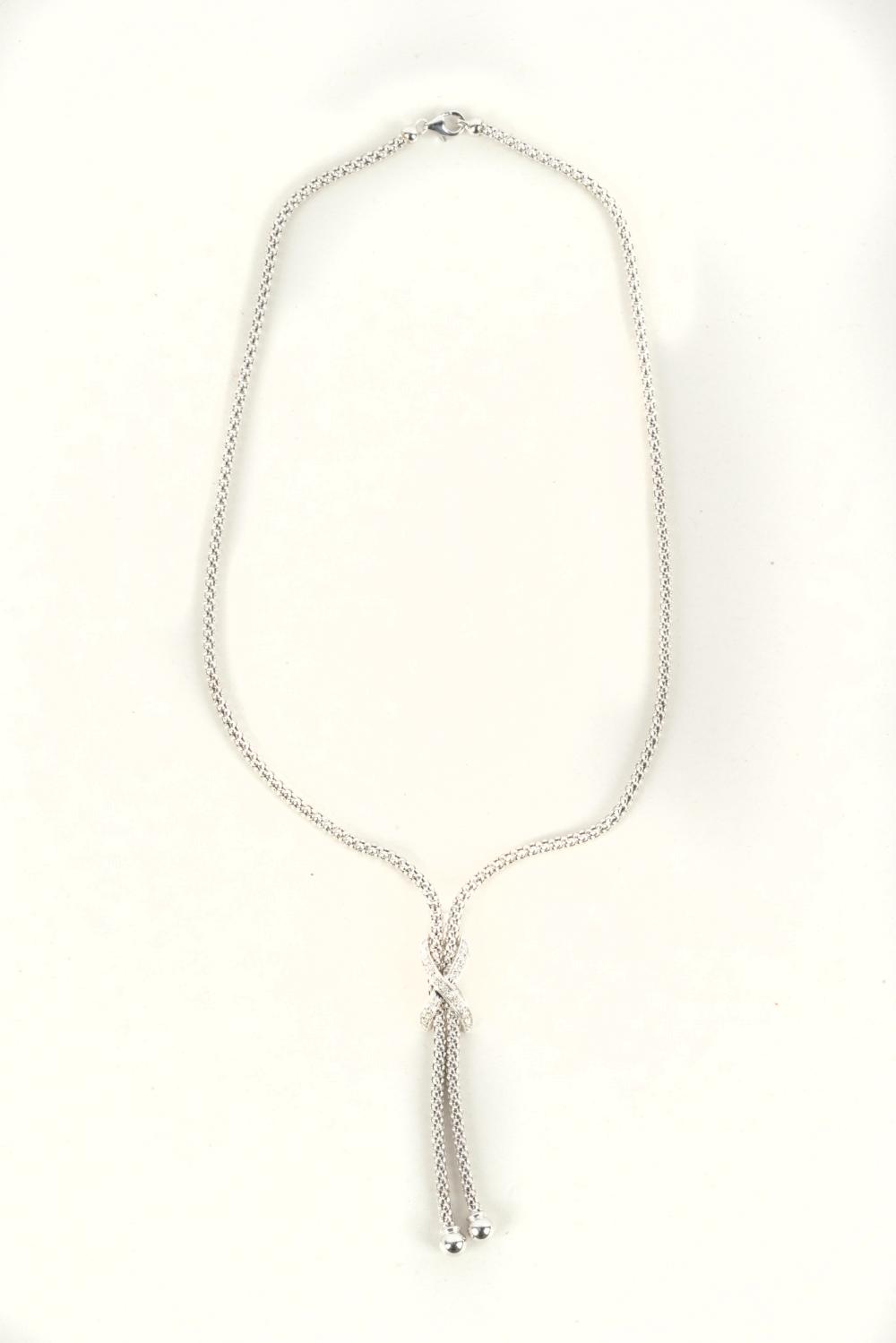 18 KARAT WHITE GOLD & DIAMOND