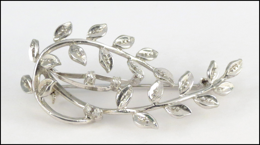 18 KARAT WHITE GOLD AND DIAMOND