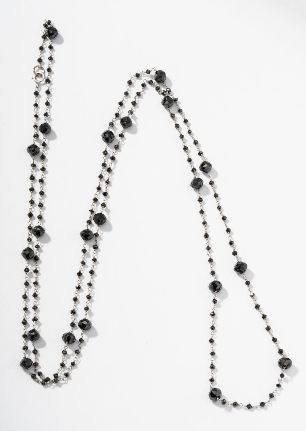 18 KARAT WHITE GOLD AND FANCY BLACK