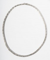 18 KARAT WHITE GOLD AND DIAMON