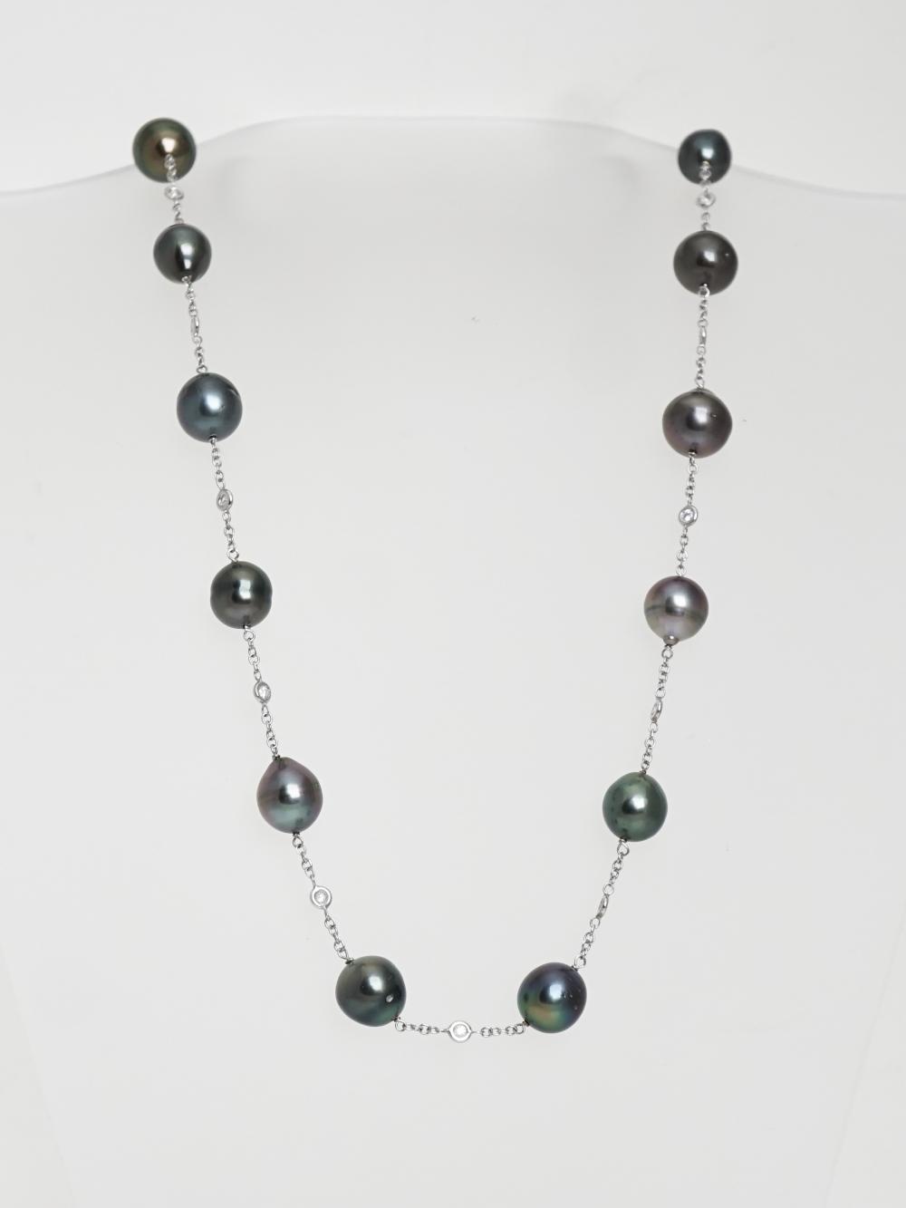 18-KARAT WHITE-GOLD, BAROQUE