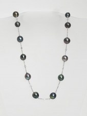 18-KARAT WHITE-GOLD, BAROQUE T