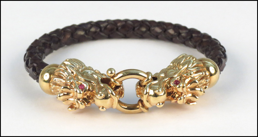 18 KARAT YELLLOW GOLD AND LEATHER