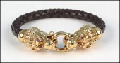 18 KARAT YELLLOW GOLD AND LEAT