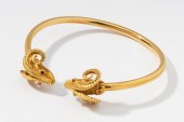 18 KARAT YELLOW GOLD AND RUBY