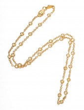 18 KARAT YELLOW GOLD AND DIAMO