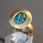 18-KARAT YELLOW-GOLD AND BLACK