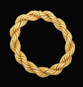 18 karat yellow gold woven fle