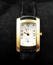 18 KT. GOLD LADIES BAUME & MER